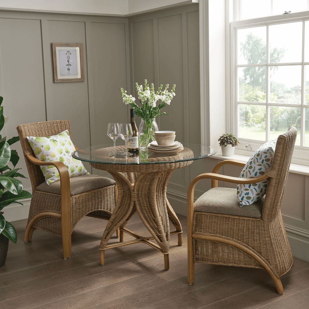 A conservatory furniture table and chairs
