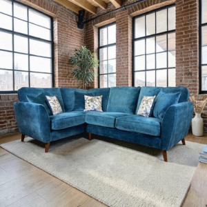 Antigua Corner Sofa in Teal with dark wooden legs.  By Lebus Upholstery